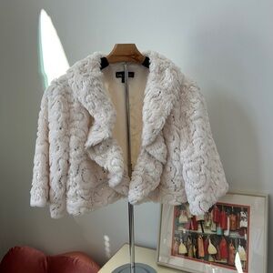 Pre-owned faux cream bolero jacket, size L. Silver sequin detail.